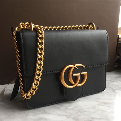 gucci black handbag with gold chain|gucci black purse with chain.